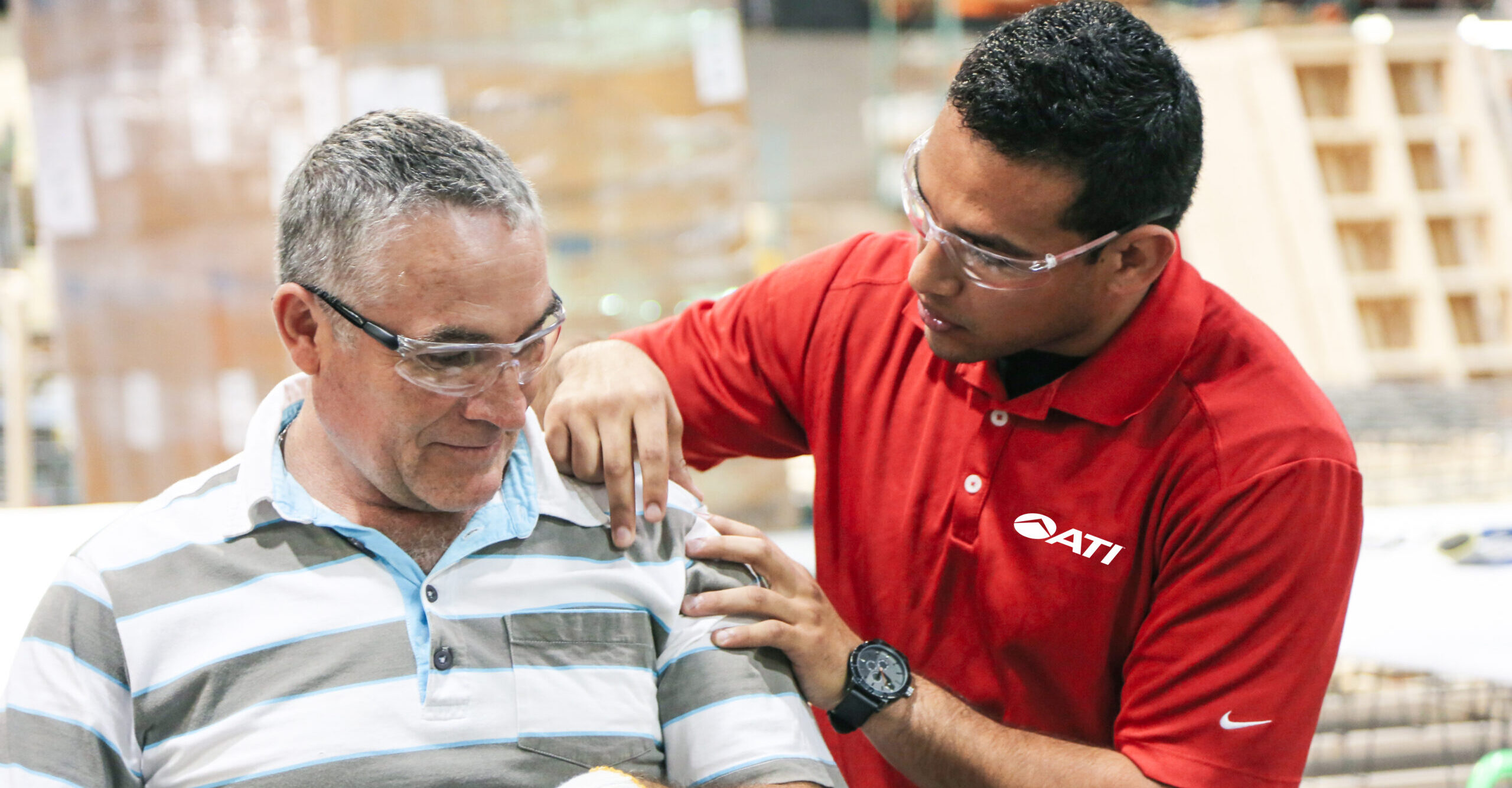 On-site therapist providing care to a worker